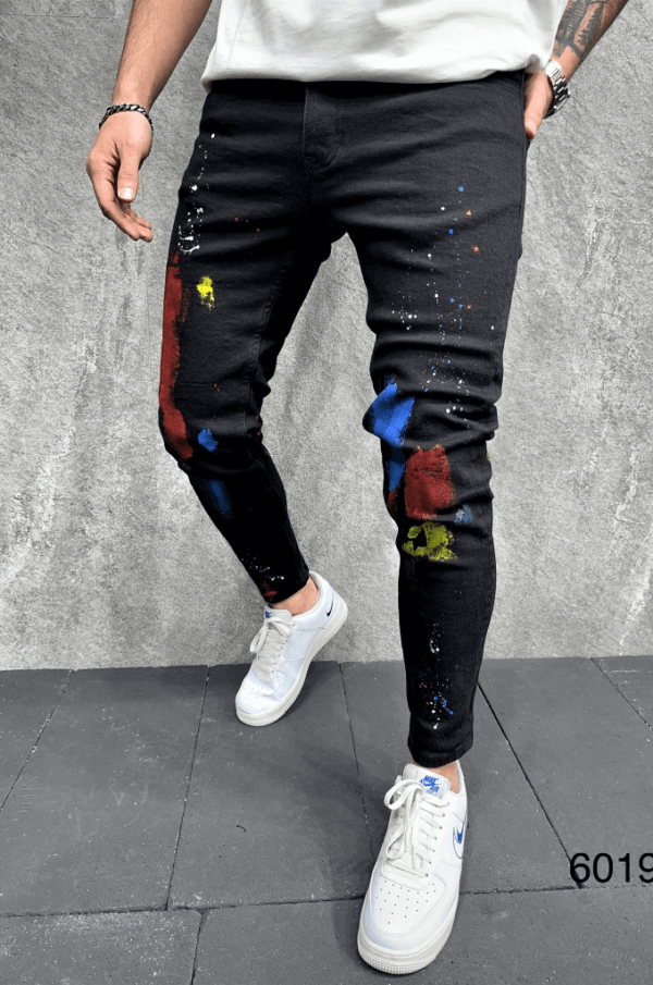 Spodnie jeansowe męskie slim fit czarne z plamami farby