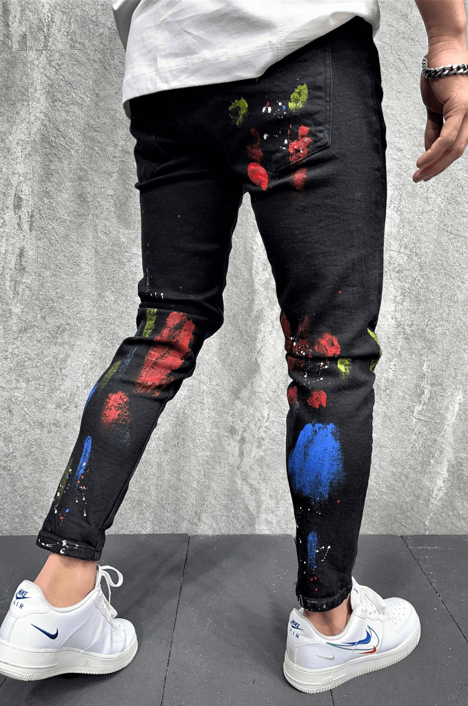 Spodnie jeansowe męskie slim fit czarne z plamami farby