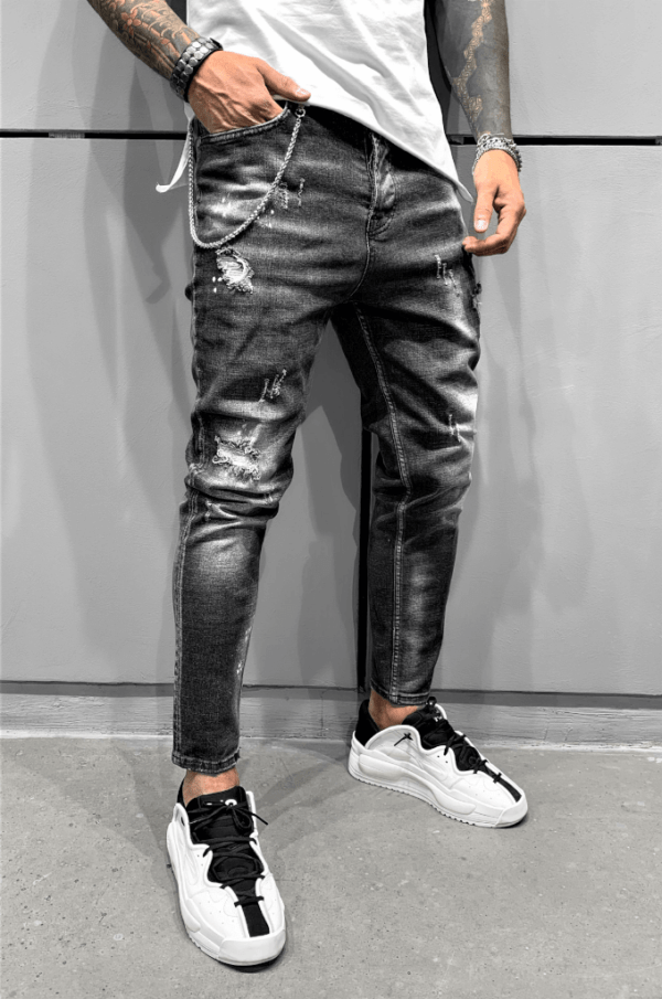 Spodnie męskie jeansowe rurki czarne z plamami farby i łańcuchem