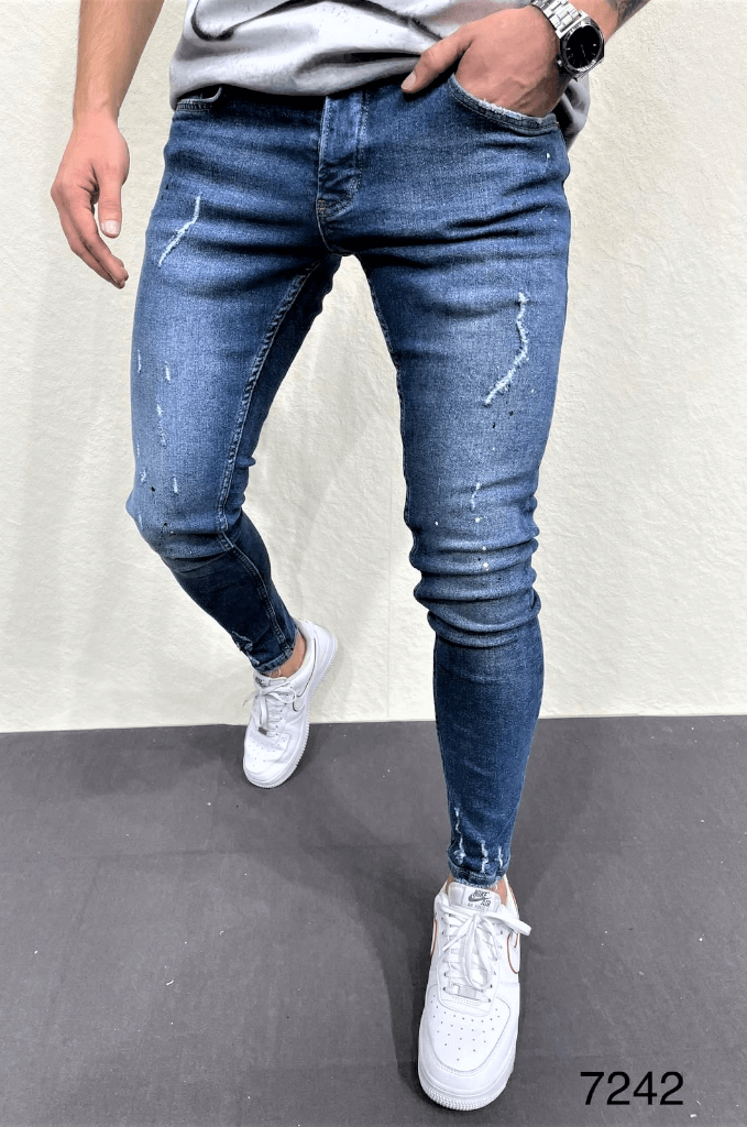 Spodnie jeansowe rurki męskie niebieskie z przetarciami
