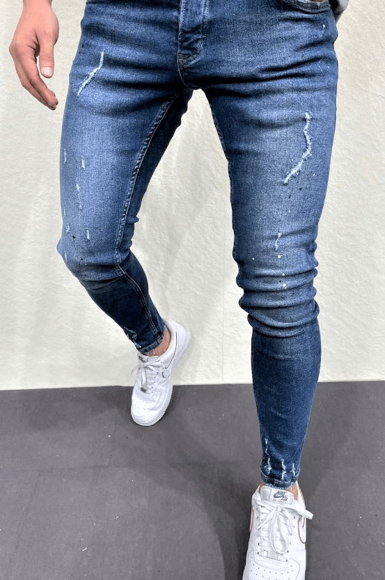 Spodnie jeansowe rurki męskie niebieskie z przetarciami