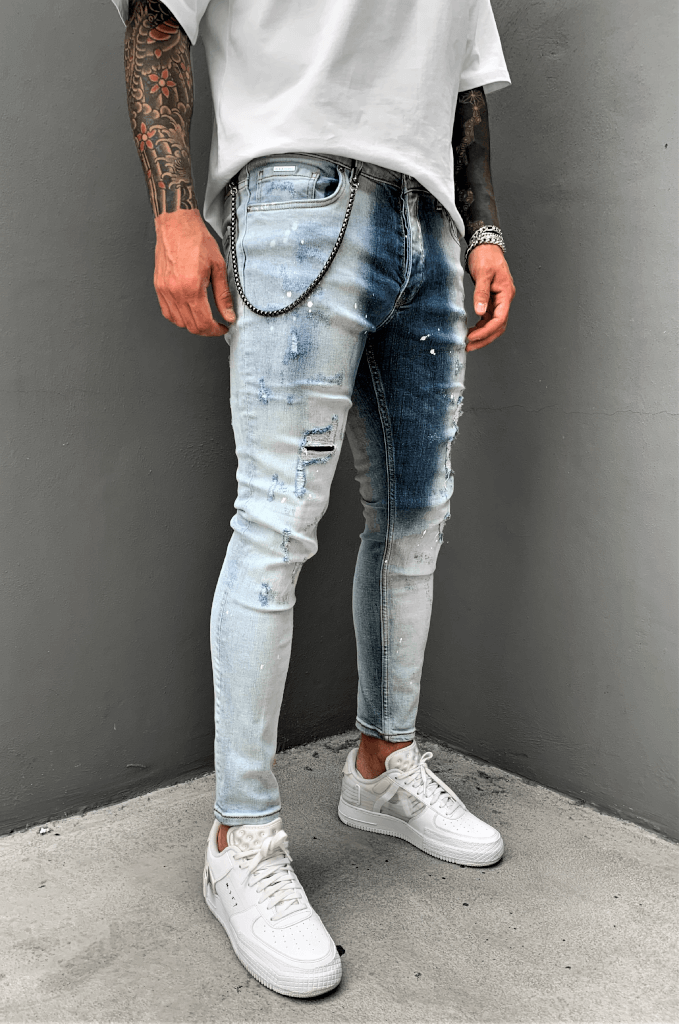 Spodnie jeansowe męskie rurki białe z plamami farby i łańcuchem