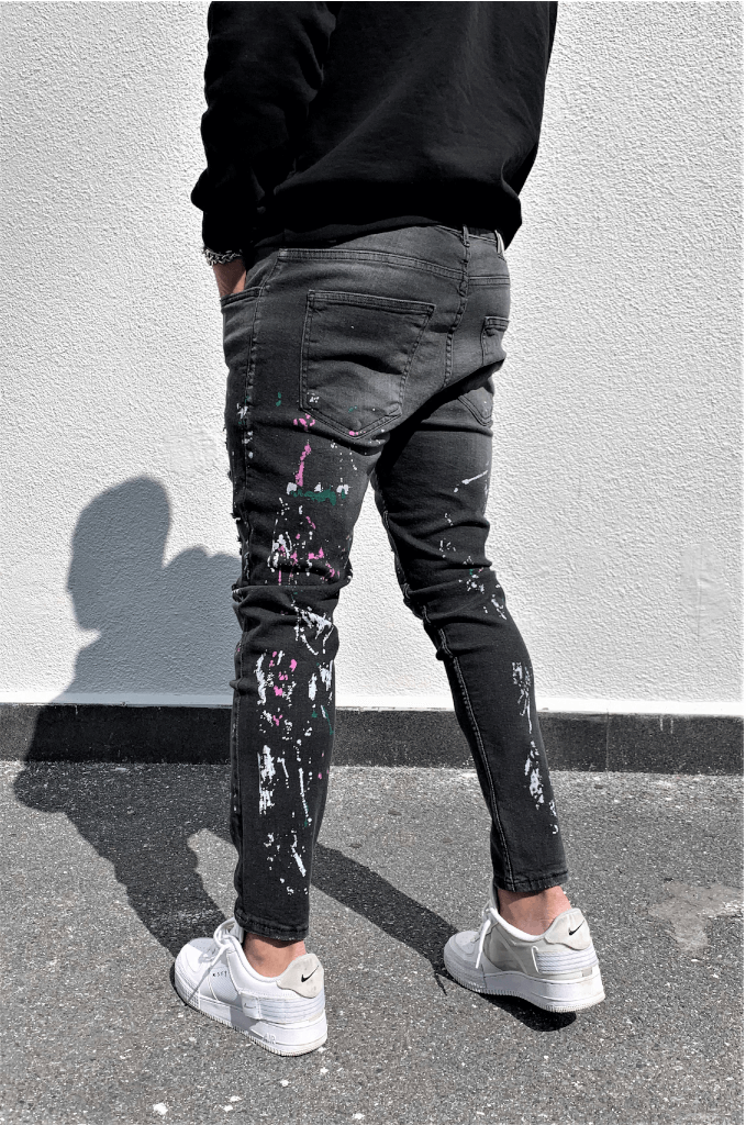 Spodnie jeansowe męskie rurki z dziurami i plamami farby