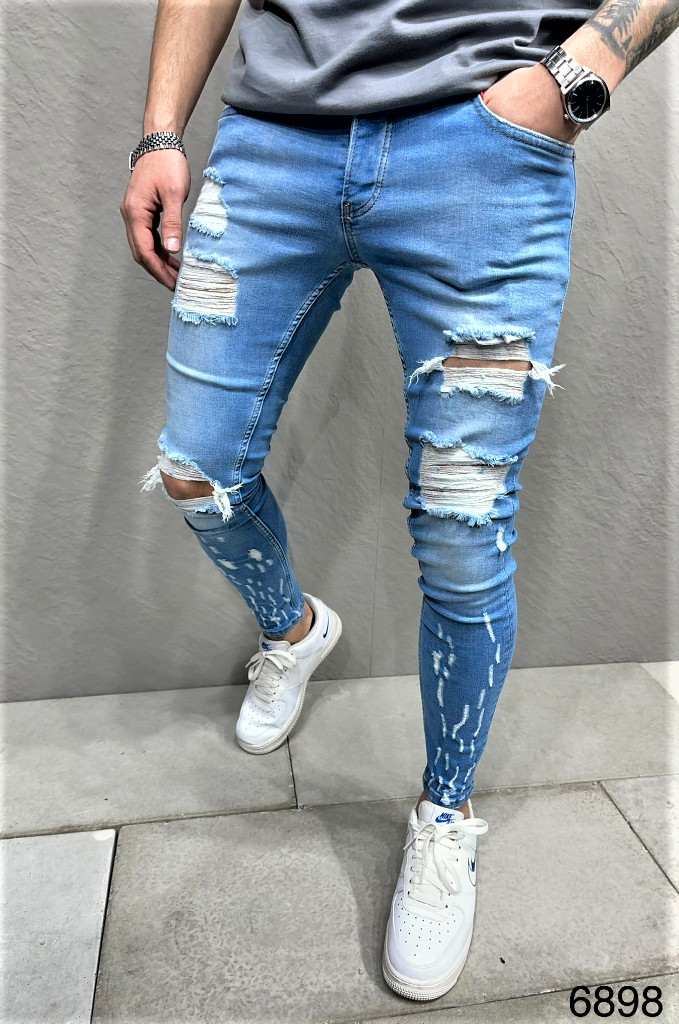 Spodnie jeansowe męskie z dziurami w kolanach i przetarciami niebieskie