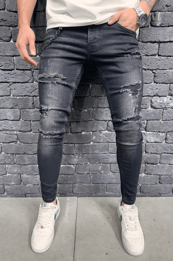 Spodnie jeansowe męskie w czarnym kolorze rurki z łańcuchem i dziurami na kolanach