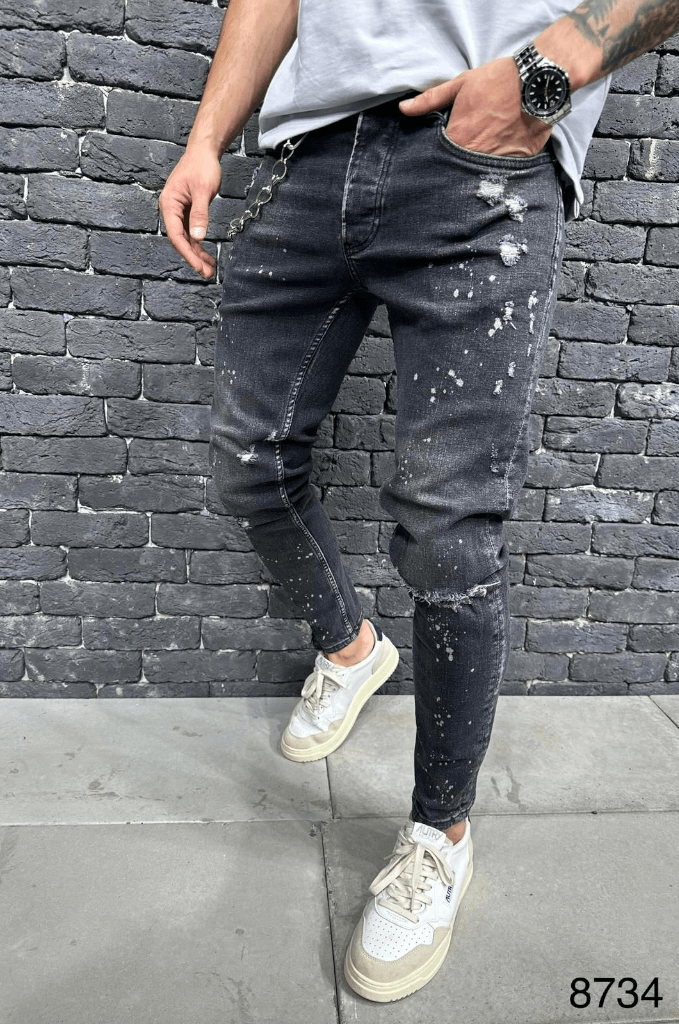Spodnie Jeansowe męskie typu rurki z plamami farby na nogawkach oraz z dziurami na kolanach Spodnie szare z łańcuchem