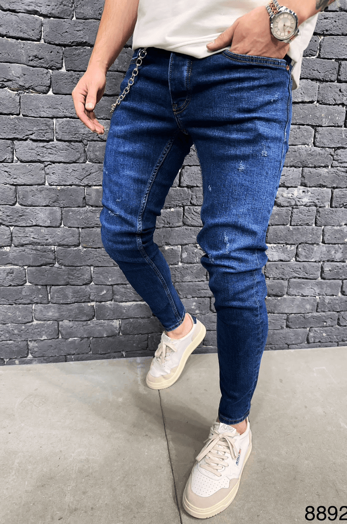 Spodnie Jeansowe męskie rurki w niebieskim kolorze z łańcuchem i przetarciami