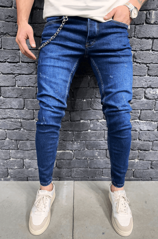 Spodnie Jeansowe męskie rurki w niebieskim kolorze z łańcuchem i przetarciami