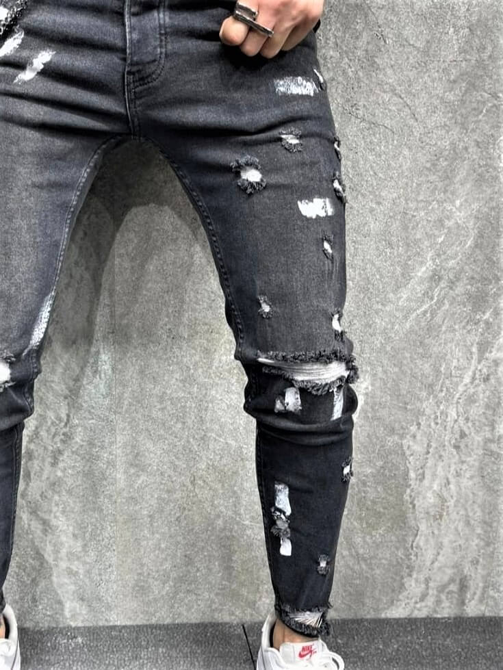 Spodnie jeansowe męskie czarne rurki z plamami farby