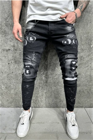 Spodnie jeansowe męskie slim fit czarne z plamami farby i dziurami