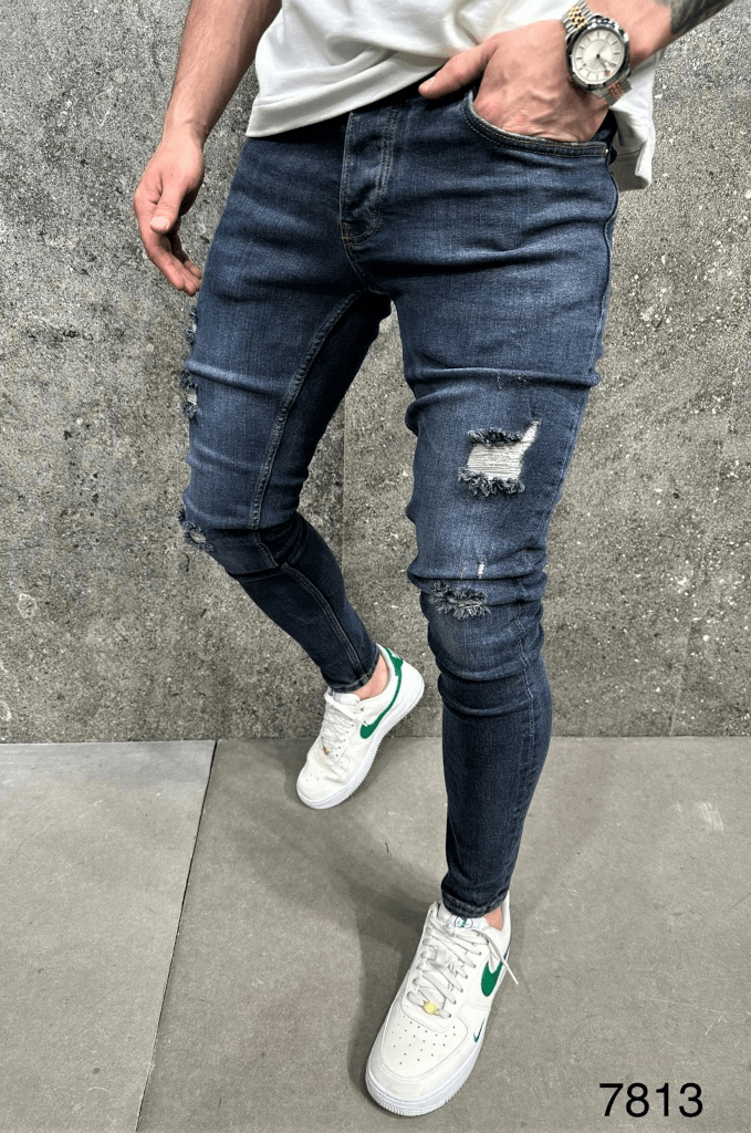 Spodnie jeansowe męskie niebieskie z dziurami na kolanach