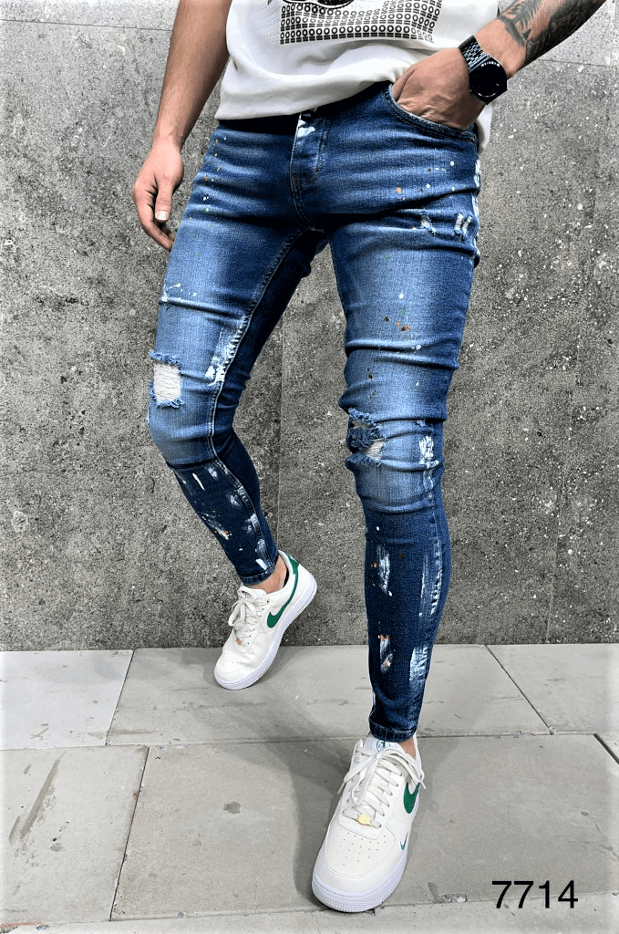 Spodnie jeansowe męskie rurki z przetarciami i dziurami oraz plamami farby