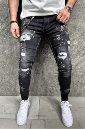 Spodnie jeansowe męskie rurki czarne z łańcuchem i plamami farby i dziurami