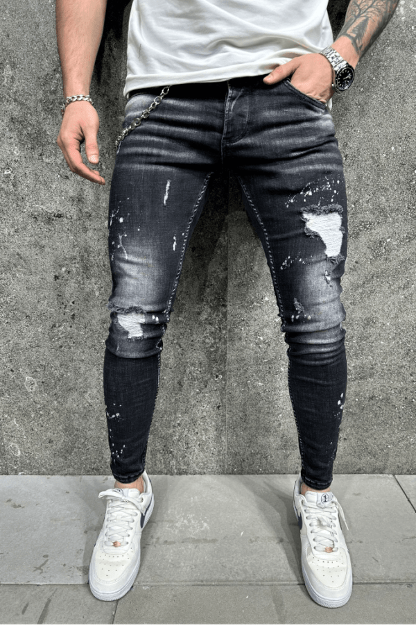 Spodnie jeansowe męskie czarne slim fit z dziurami i plamami farby