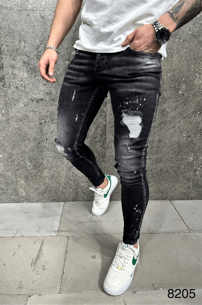 Spodnie jeansowe męskie czarne slim fit z dziurami i plamami farby i łańcuchem