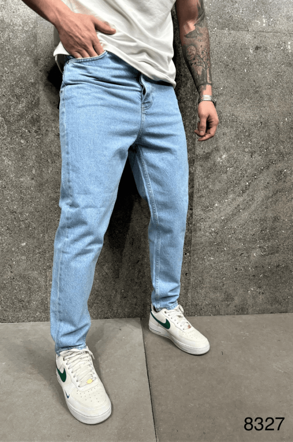 Szerokie spodnie baggy męskie w jasnym niebieskim kolorze