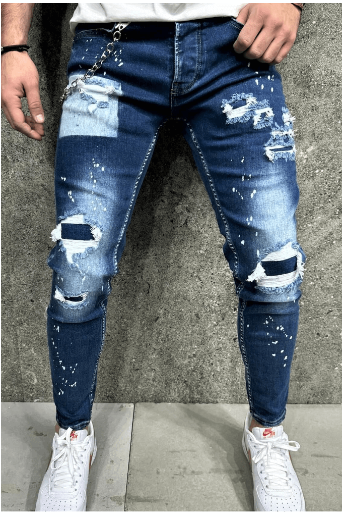 Spodnie jeansowe męskie rurki niebieskie z łatami łańcuchem i plamami farby i dziurami