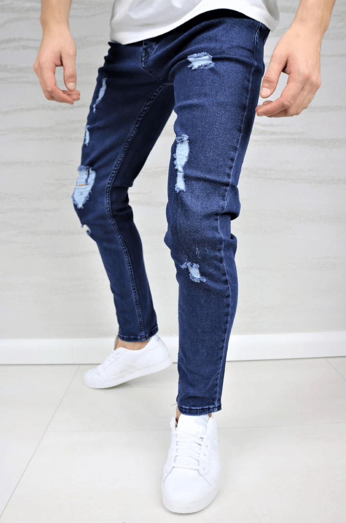 Spodnie jeansowe męskie rurki niebieskie z dziurami w kolanach