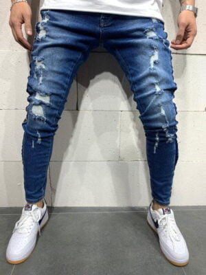 Spodnie jeansowe męskie slim fit niebieskie z przetarciami